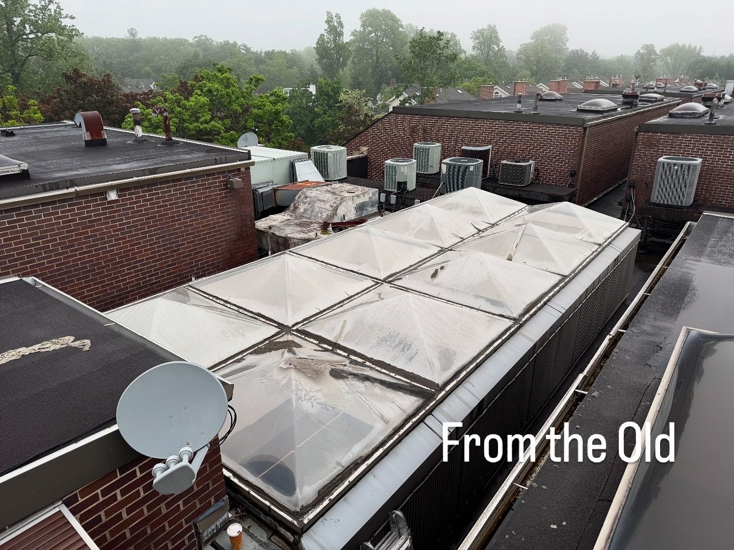 Before — aged acrylic pyramid skylights