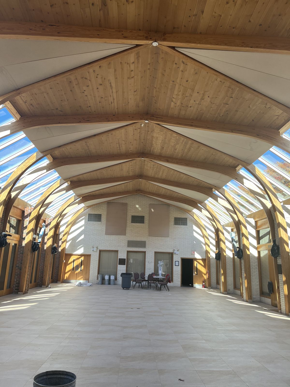 Sanctuary hall clerestory glazing — arched glulam structure