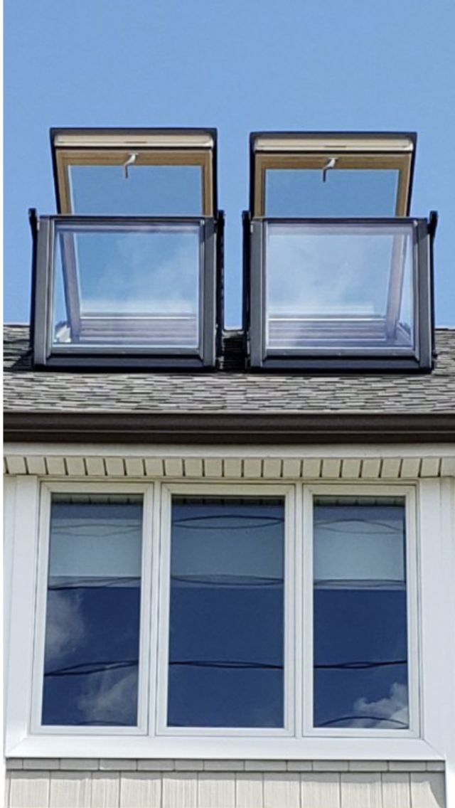 Twin balcony roof windows, opened