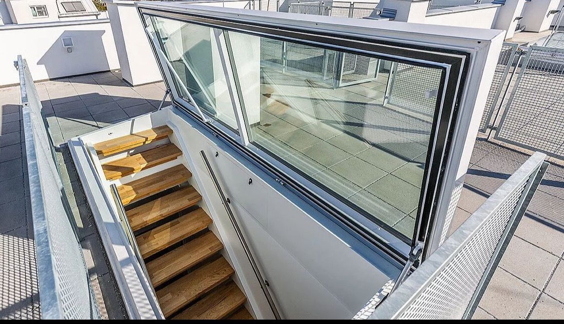 Glass roof-access hatch