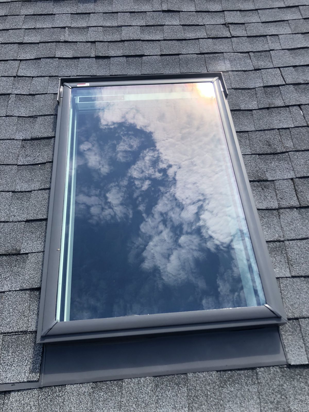 Deck-mounted skylight with factory shade
