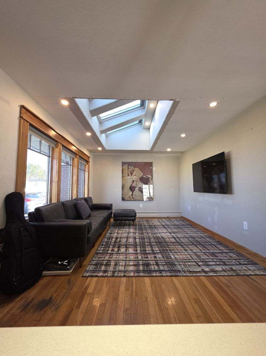 Skylight well transforming a living room